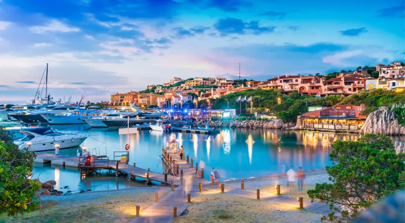 La Maddalena town marina at dusk with moored boats